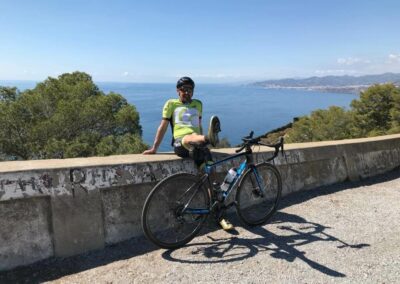 Road cyclist in front of the Mediterranean Sea